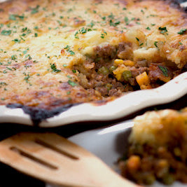 Shepherd's pie with mashed potato topping in baking dish.