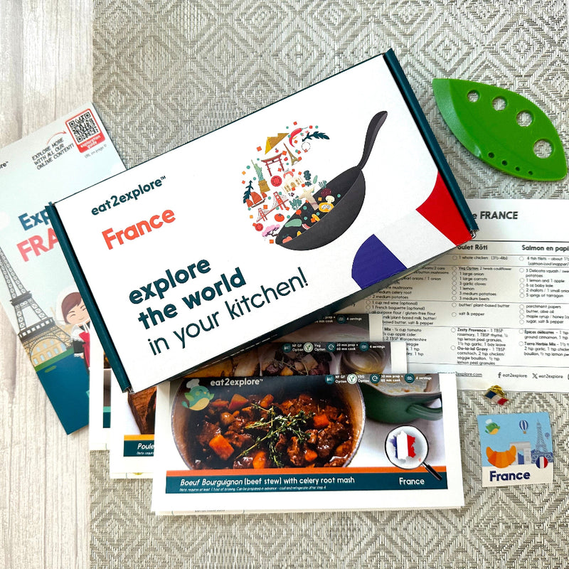 Explore France culinary kit with recipe cards and kitchen tool.