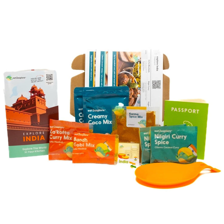 Collection of spice mixes and packaging on a white background