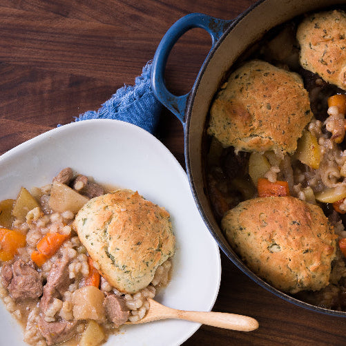 hearty beef stew with dumplings and vegetables

