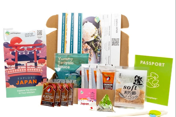Collection of Japanese-themed products including packets and a passport on a white background