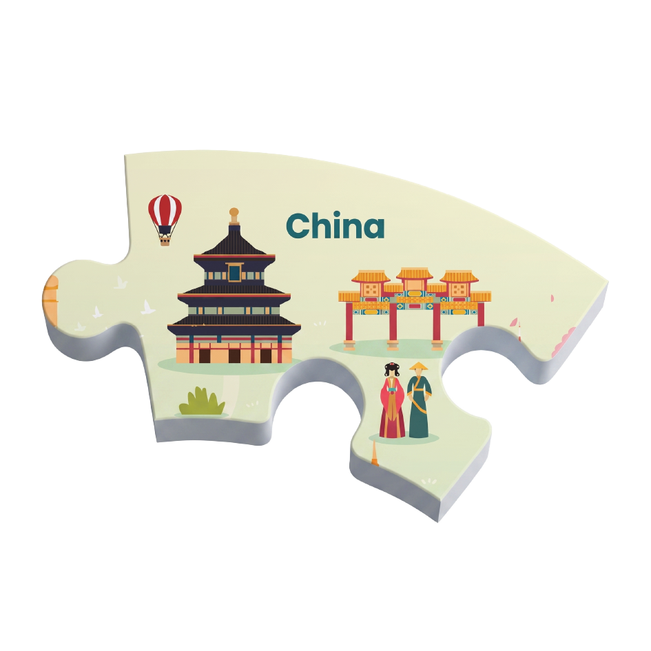 A 3D jigsaw puzzle piece shaped like China, featuring illustrations of the Temple of Heaven, a hot air balloon, a traditional archway, and two figures in Hanfu clothing on a pale cream background, with the word 'China' printed in teal.