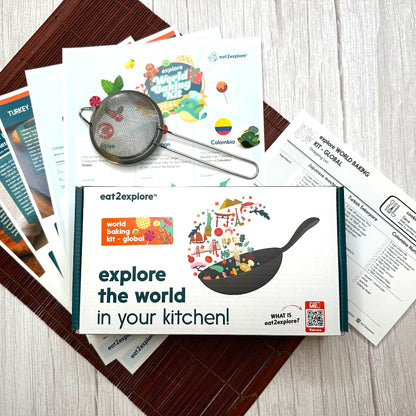 Educational kit for cooking around the world on a wooden surface