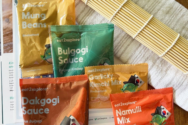 spice/sauce/grain mixes for South Korea with sushi mat